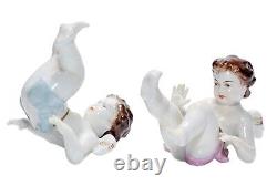 2 RUDOLSTADT VOLKSTEDT Antique Hand Painted Tumbling Germany Porcelain Figurines