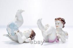 2 RUDOLSTADT VOLKSTEDT Antique Hand Painted Tumbling Germany Porcelain Figurines