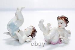 2 RUDOLSTADT VOLKSTEDT Antique Hand Painted Tumbling Germany Porcelain Figurines