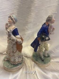 Antique 19th Century Pair Of Dresden Multi-Color Porcelain Colonial Figurines