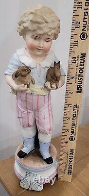 Antique German Bisque Boy Figurine Holding Two Bunny Rabbit Heubach