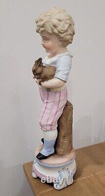 Antique German Bisque Boy Figurine Holding Two Bunny Rabbit Heubach