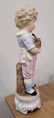 Antique German Bisque Boy Figurine Holding Two Bunny Rabbit Heubach