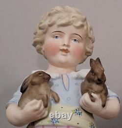 Antique German Bisque Boy Figurine Holding Two Bunny Rabbit Heubach