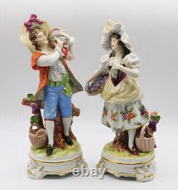 Antique German Bisque Porcelain Figurines of a Young Couple with flowers Marked