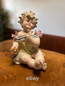 Antique Pair of German Conta Boehme Piano Baby Bisque Porcelain Figurines