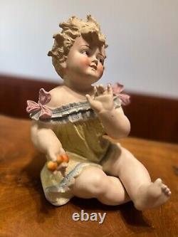 Antique Pair of German Conta Boehme Piano Baby Bisque Porcelain Figurines