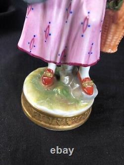 Antique german porcelain lady with flowerbasket. Marked Bottom + number