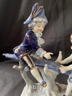 Antique german volkstedt porcelain figurine boy and girl playing. Marked