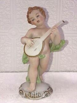Cherubs Playing Instruments Figurines, Set of 4, 7 Tall, Germany, Vintage