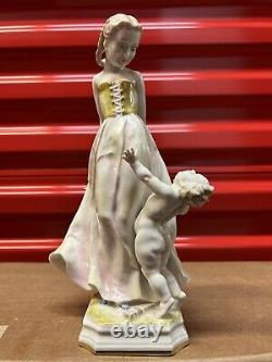 Hutchenreuther Art Deco Porcelain Girl Figurine with Playful Cherub