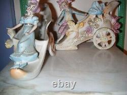Pair of Antique Bisque Porcelain Figurines on Wheeled Shoes VERY RARE