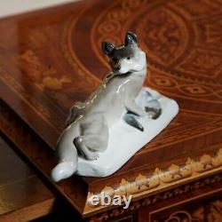Stylish antique Porcelain figurine Marten with a bird 1974-1990s made in germany