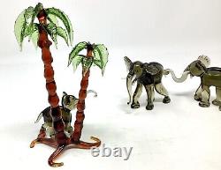 VTG Handmade Glass Elephants withtrunks holding tails under Palm tree Germany 50s