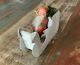 Vintage Clay Faced Santa Figure In Cardboard Sleigh Carrying A Christmas Tree