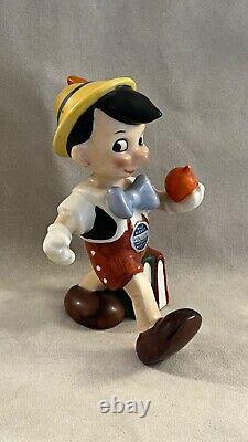 Vintage Disney Character figurine, Pinocchio walking with apple, Goebel Germany