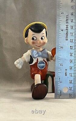 Vintage Disney Character figurine, Pinocchio walking with apple, Goebel Germany