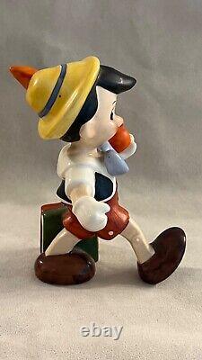 Vintage Disney Character figurine, Pinocchio walking with apple, Goebel Germany