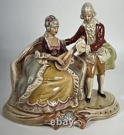 Vintage GDR Porcelain Couple Cording Figurine Made in Germany 9 X 8 Musictions