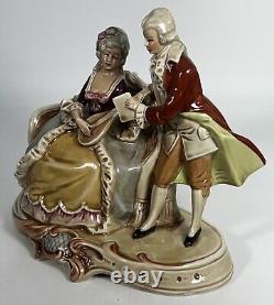 Vintage GDR Porcelain Couple Cording Figurine Made in Germany 9 X 8 Musictions