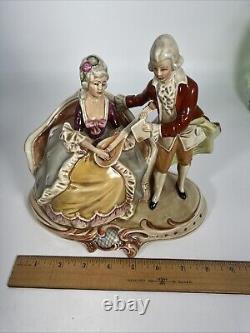 Vintage GDR Porcelain Couple Cording Figurine Made in Germany 9 X 8 Musictions